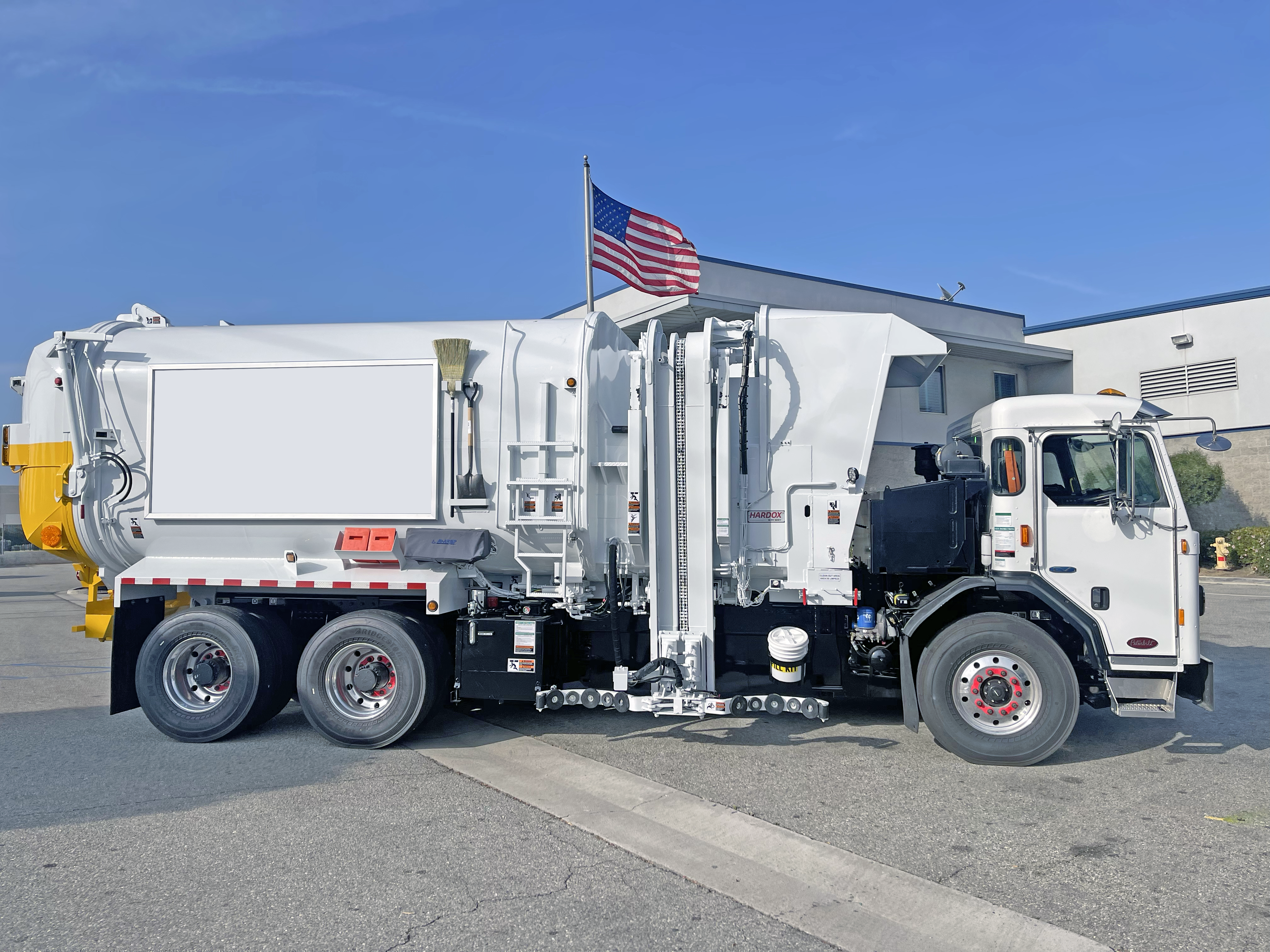 Amrep automated side loader
